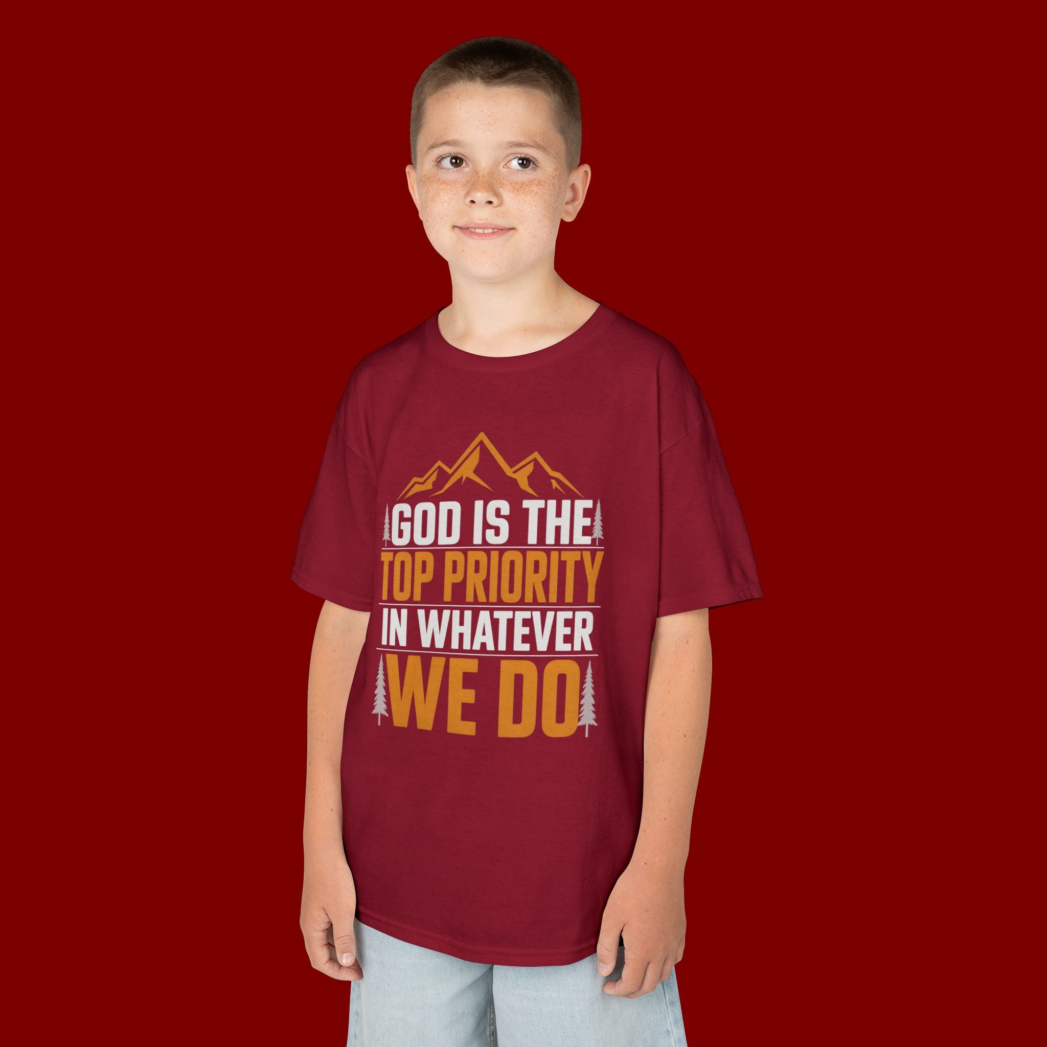 Kids Tee - "God Is the Top Priority in Whatever We Do" Faith Mountain Graphic