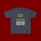 Kids Tee – "Pray & Never Give Up" Inspirational Plant Graphic