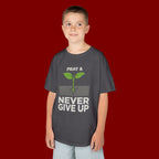 Kids Tee – "Pray & Never Give Up" Inspirational Plant Graphic