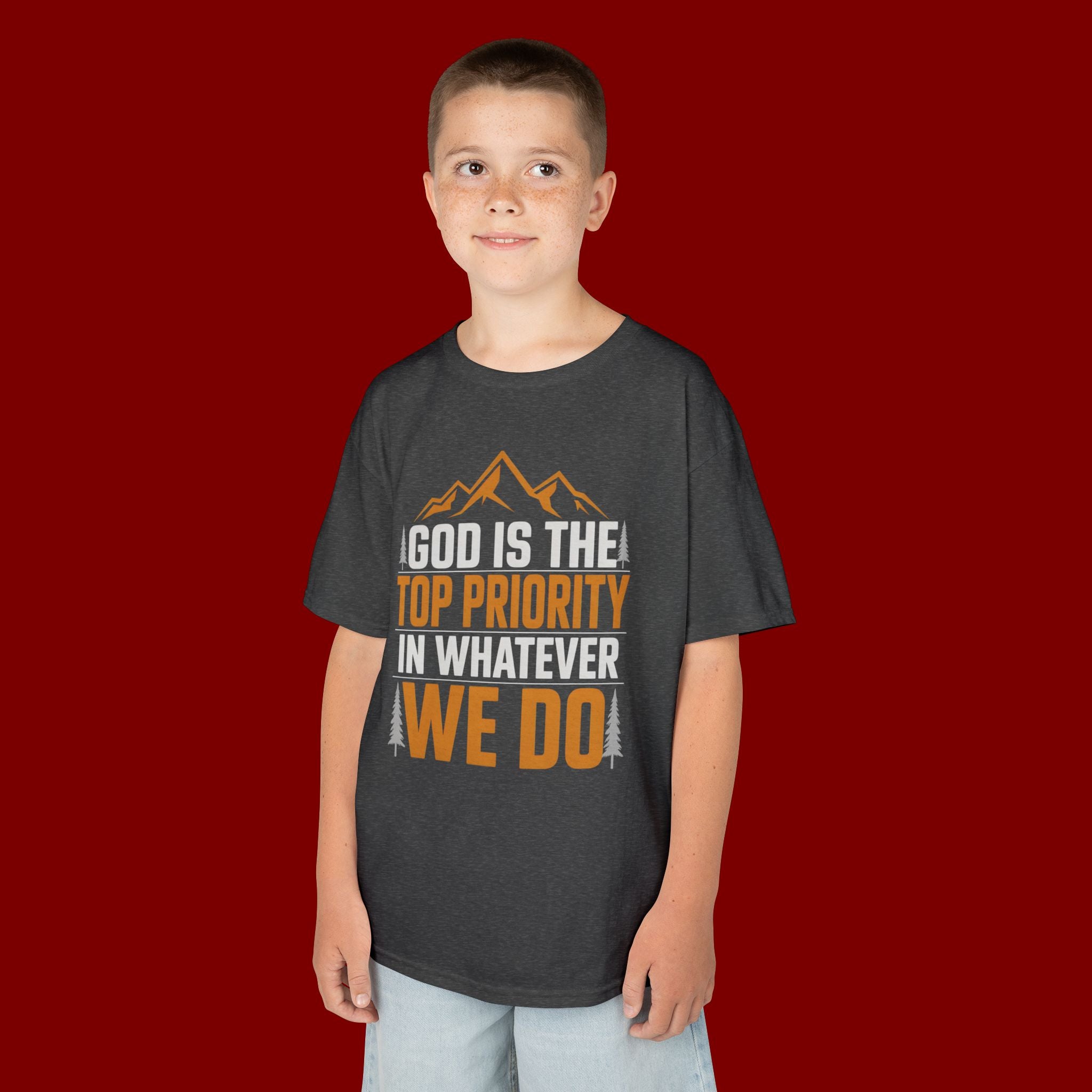 Kids Tee - "God Is the Top Priority in Whatever We Do" Faith Mountain Graphic