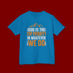 Kids Tee - "God Is the Top Priority in Whatever We Do" Faith Mountain Graphic