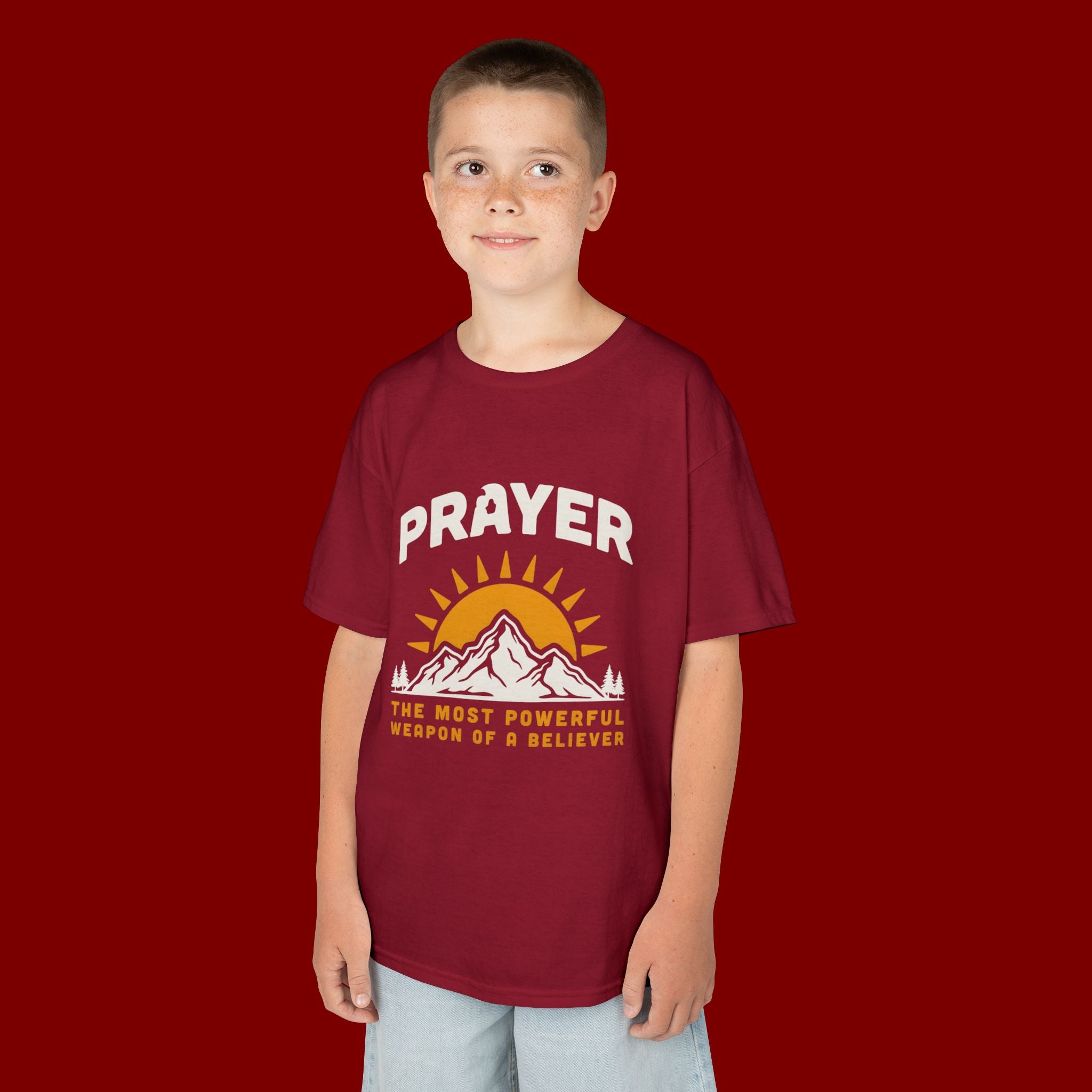 Kids Tee — "Prayer: The Most Powerful Weapon of a Believer" Mountain Sun Graphic