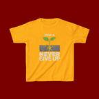 Kids Tee – "Pray & Never Give Up" Inspirational Plant Graphic