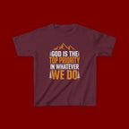 Kids Tee - "God Is the Top Priority in Whatever We Do" Faith Mountain Graphic