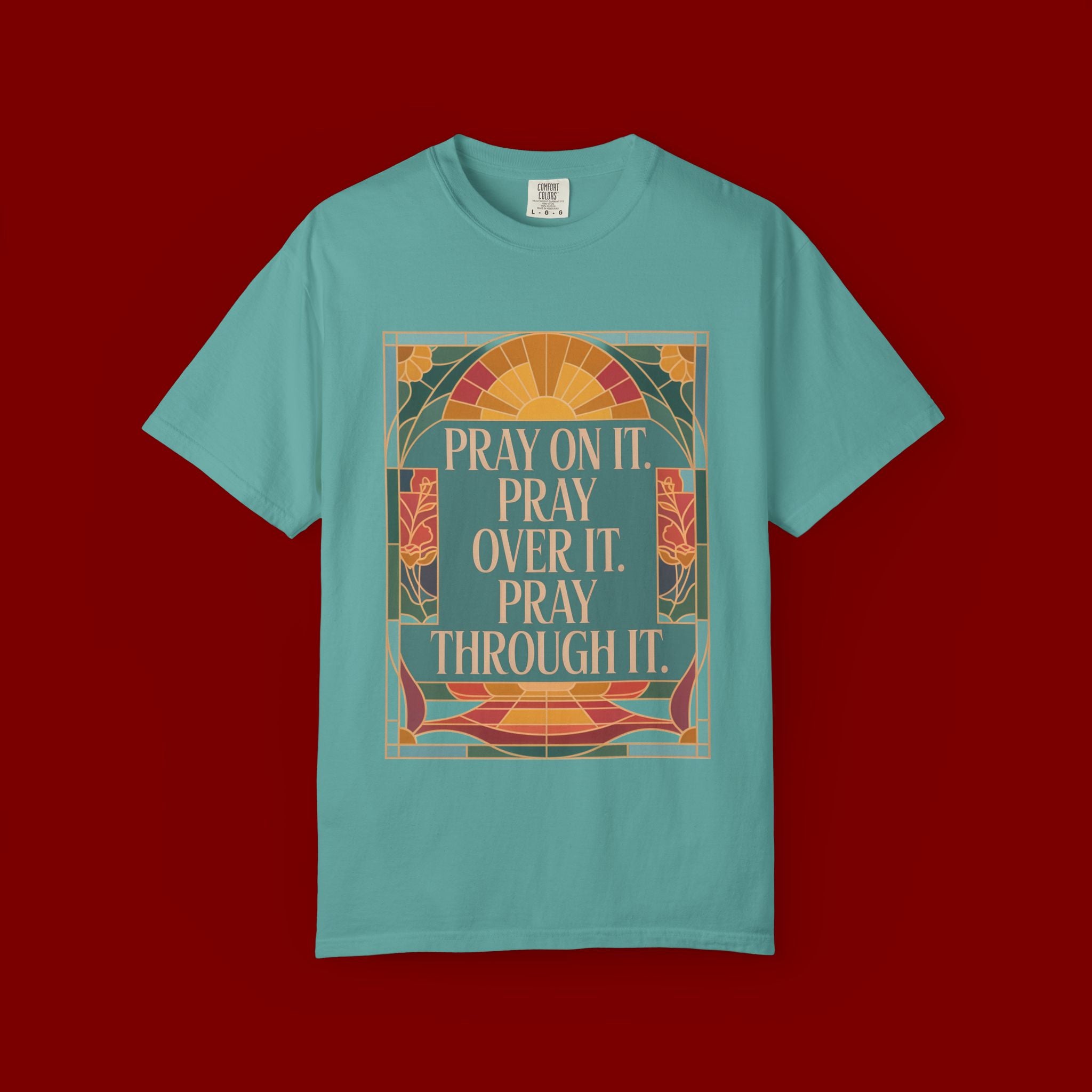 T-Shirt — Retro Sunset Floral Graphic “Play On It, Pray Over It, Pray Through It”