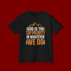 Kids Tee - "God Is the Top Priority in Whatever We Do" Faith Mountain Graphic