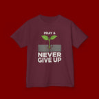 Kids Tee – "Pray & Never Give Up" Inspirational Plant Graphic