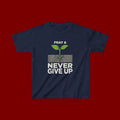 Kids Tee – "Pray & Never Give Up" Inspirational Plant Graphic