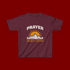 Kids Tee — "Prayer: The Most Powerful Weapon of a Believer" Mountain Sun Graphic