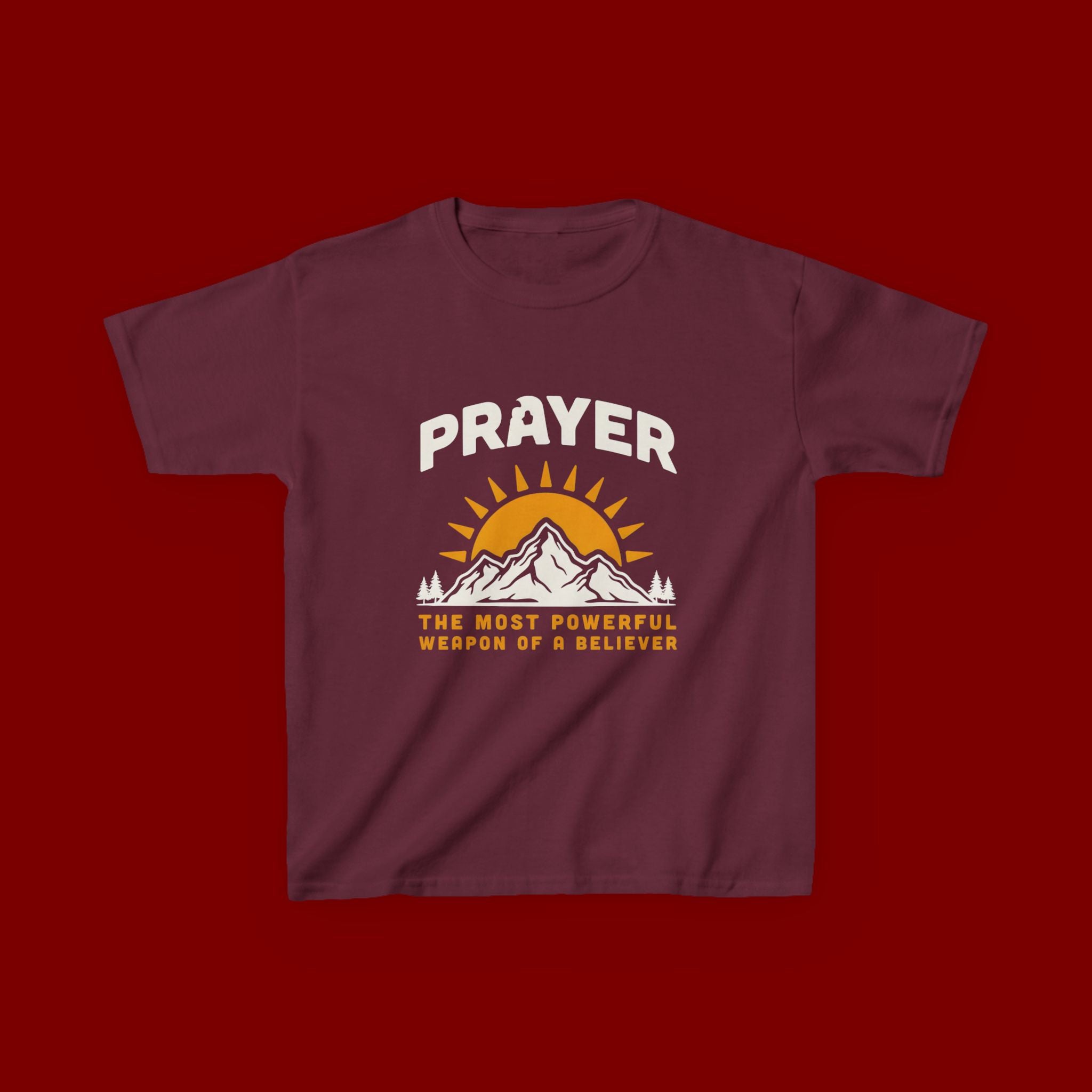 Kids Tee — "Prayer: The Most Powerful Weapon of a Believer" Mountain Sun Graphic