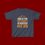 Kids Tee - "God Is the Top Priority in Whatever We Do" Faith Mountain Graphic