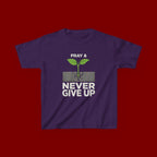 Kids Tee – "Pray & Never Give Up" Inspirational Plant Graphic